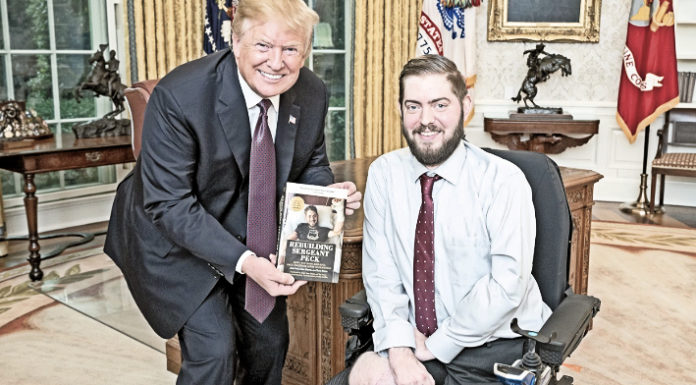 Trump meets with quadruple amputee Marine vet in Oval Office