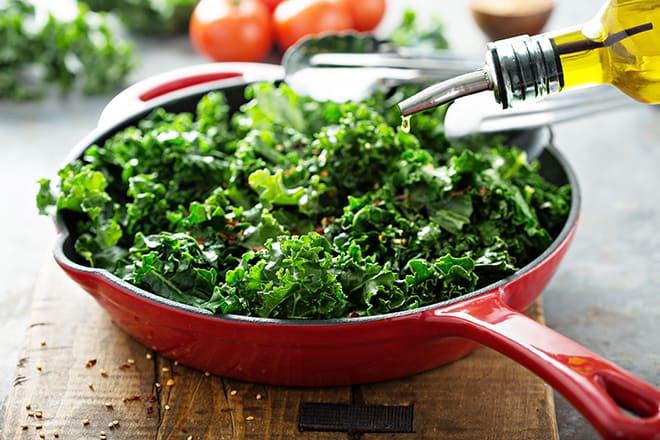 Antioxidant-Foods-You-Should-Include-in-Your-Diet-to-Stay-Healthy-Young-pan-of-kale-and-oil