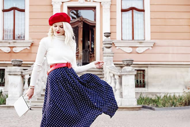 Lovely-Midi-Skirt-Outfits-to-Try-This-Fall-girl-in-polka-dot-midi-dress-and-red-baret