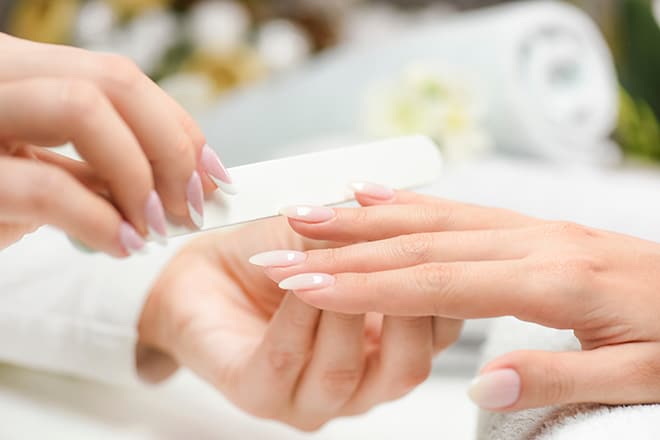 Manicure-mistakes-you-should-avoid-making-woman-getting-nails-done