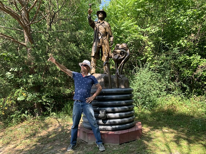 Mark-Cline's-Dinosaur-Kingdom-II-Combines-Civil-War-Soldiers-with-Dinosaurs-mark-cline-with-his-statue