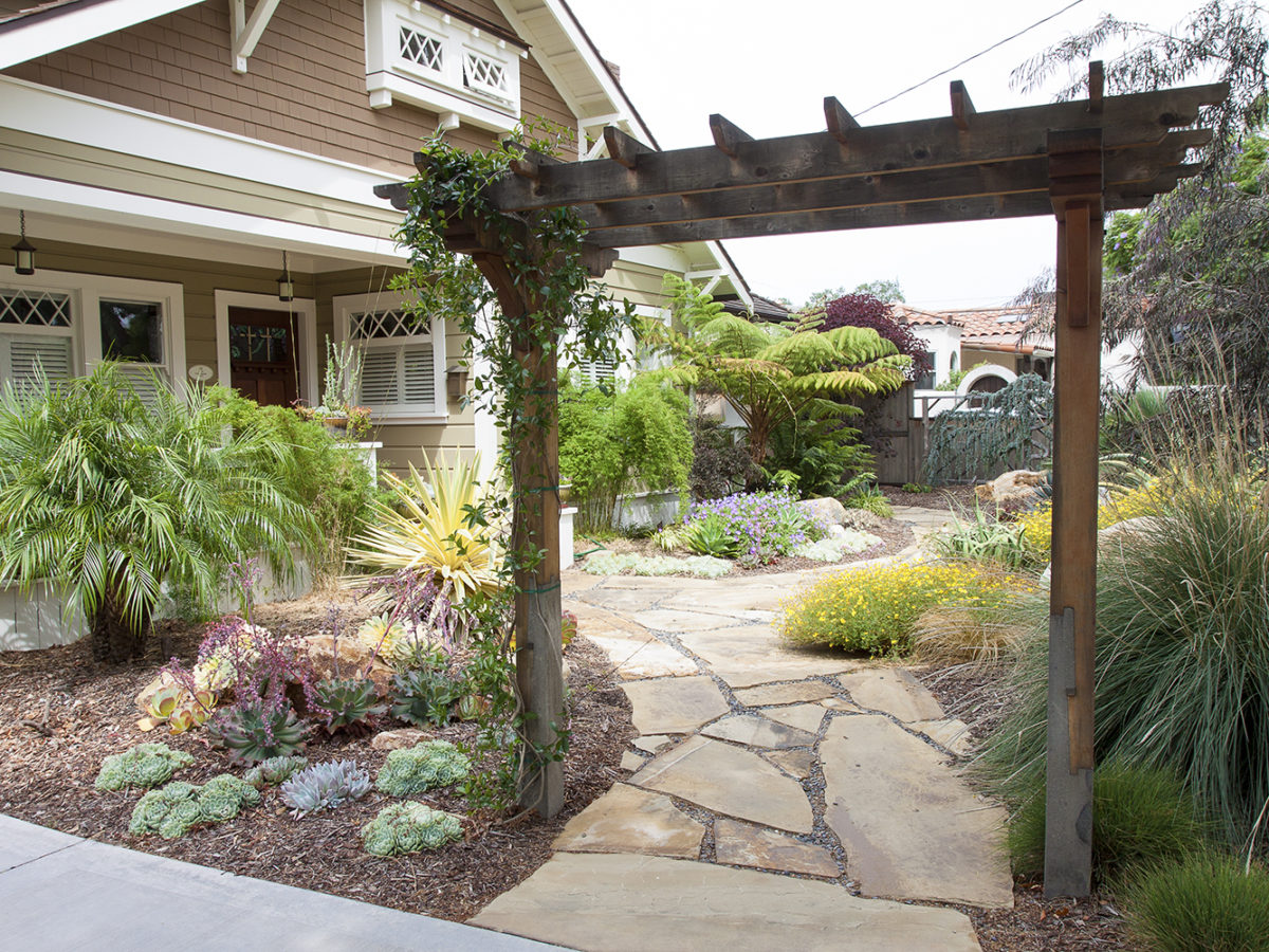 Succulent garden with lava rocks and flagstone