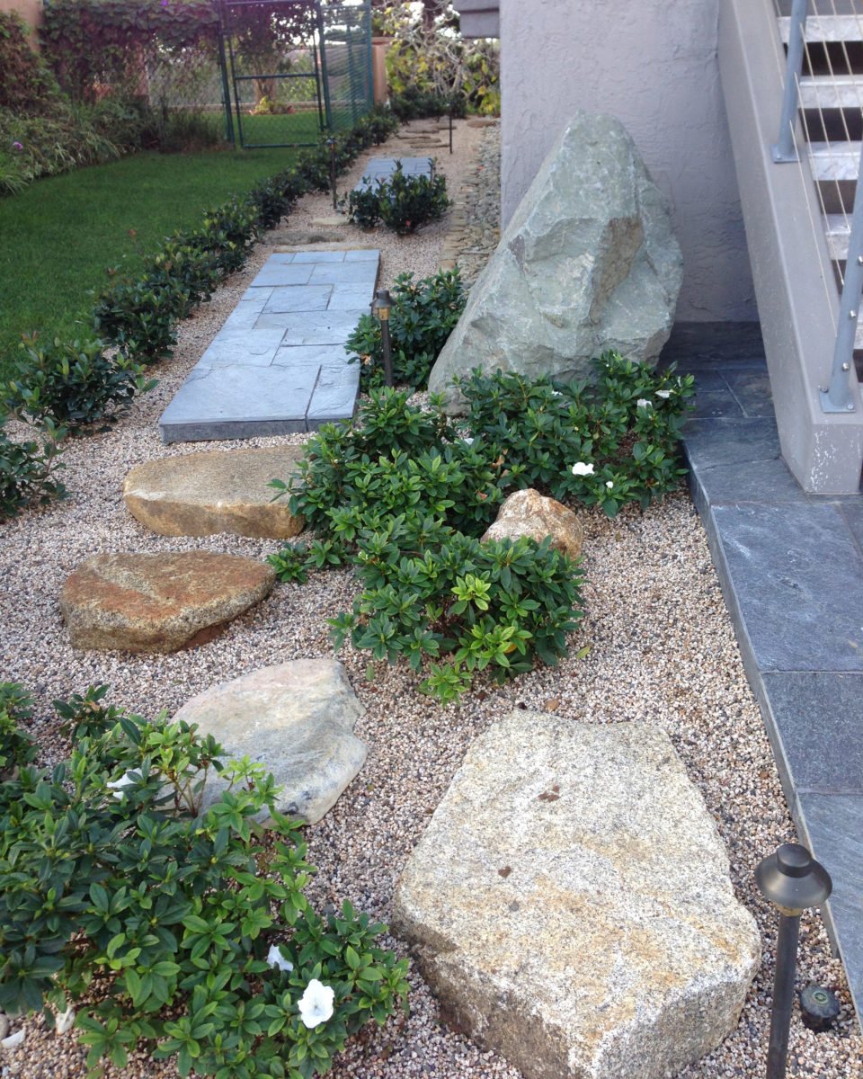 Flat boulder pathway in zen garden