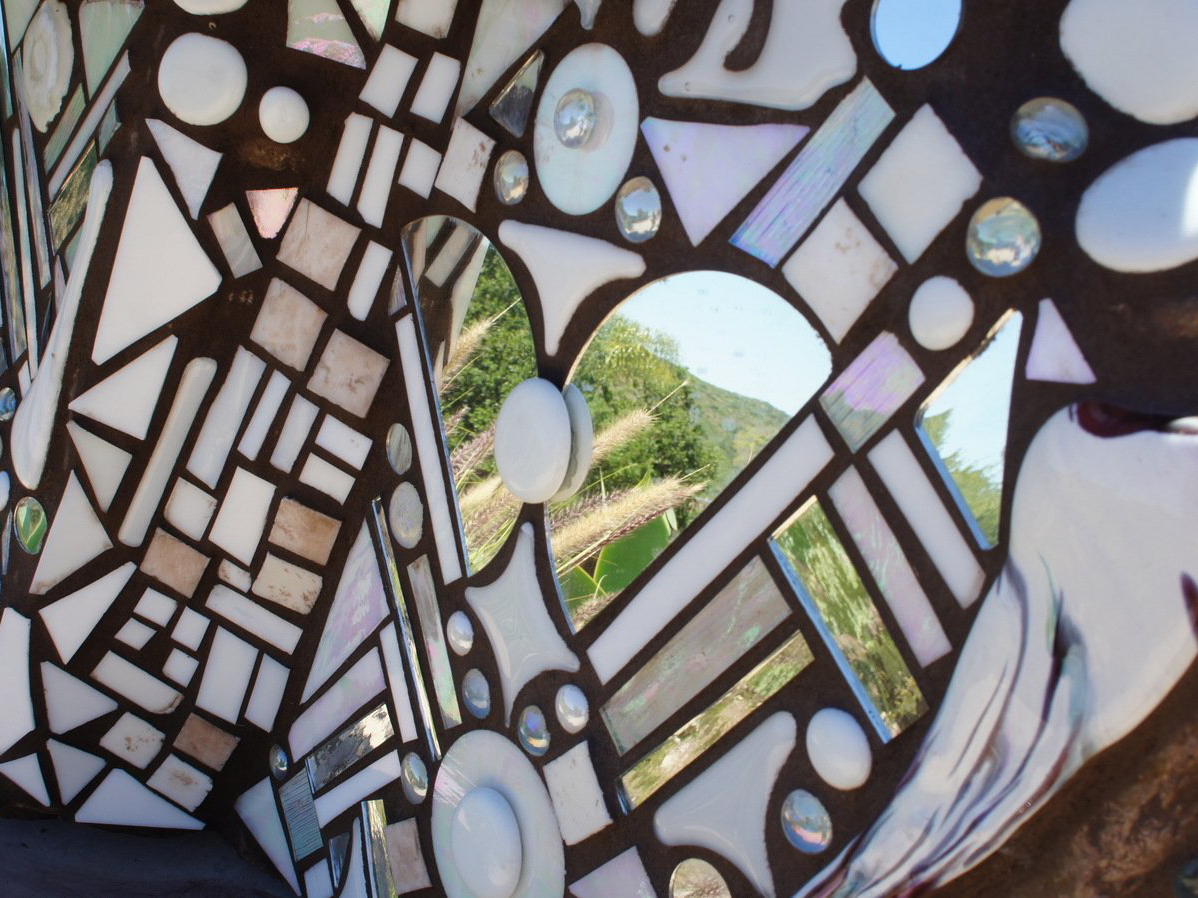 Glass and mirror on mosaic rock art piece