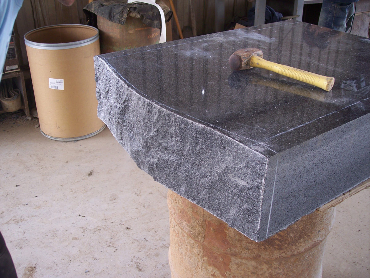 Finished pitched custom stone piece