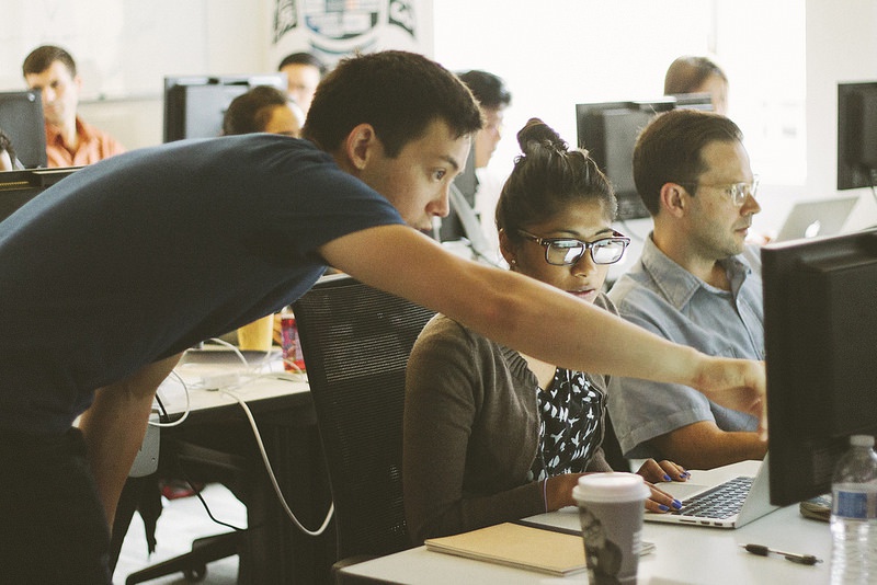 Developer teaching student Developer teaching student