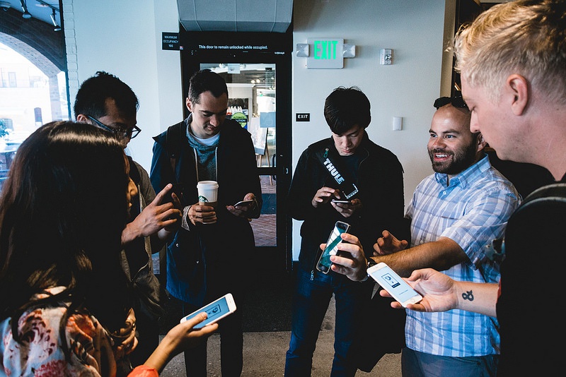 Yetis show off their phones to each other Yetis show off their phones to each other