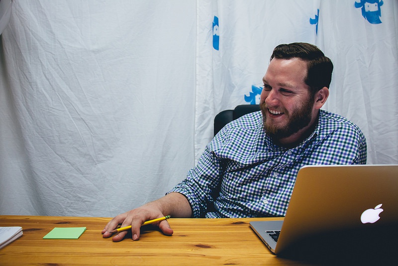 Tim Shipman laughing at a table Tim Shipman laughing at a table
