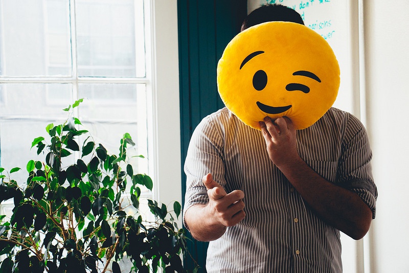 Tony Scherba holding an Emoji Tony Scherba holding an Emoji