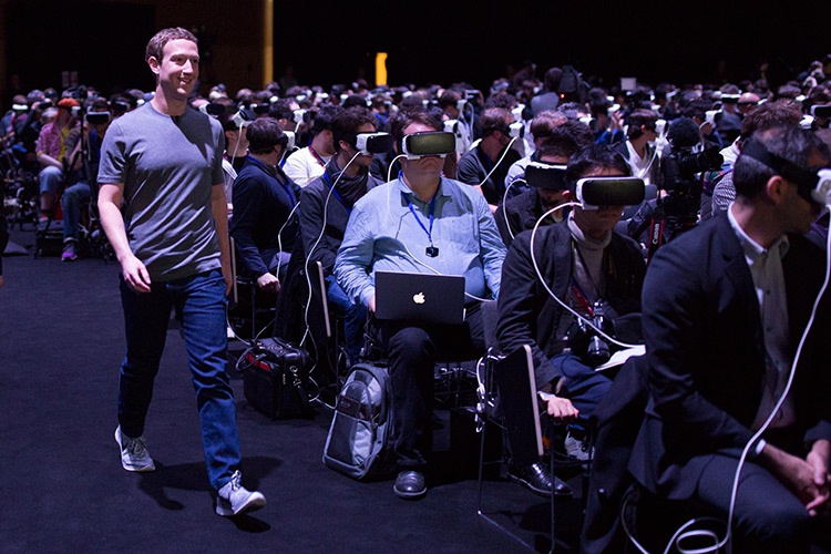 Mark Zuckerberg showing off VR headsets and applications. Facebook's founder, Mark Zuckerberg showing employees VR prototypes